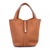 Arvelle Lock Medium 22 Champagne Gold Soft Grain Calfskin Bucket Bag - Arvelle Paris