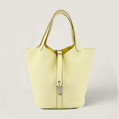 Arvelle Lock Small Sunlit Yellow Soft Grain Calfskin Bucket Bag - Arvelle Paris