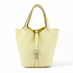 Arvelle Lock Small Sunlit Yellow Soft Grain Calfskin Bucket Bag - Arvelle Paris