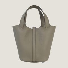 Arvelle Lock Small Desert Beige Soft Grain Calfskin Bucket Bag - Arvelle Paris