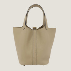 Arvelle Lock Small Greige Soft Grain Calfskin Bucket Bag - Arvelle Paris