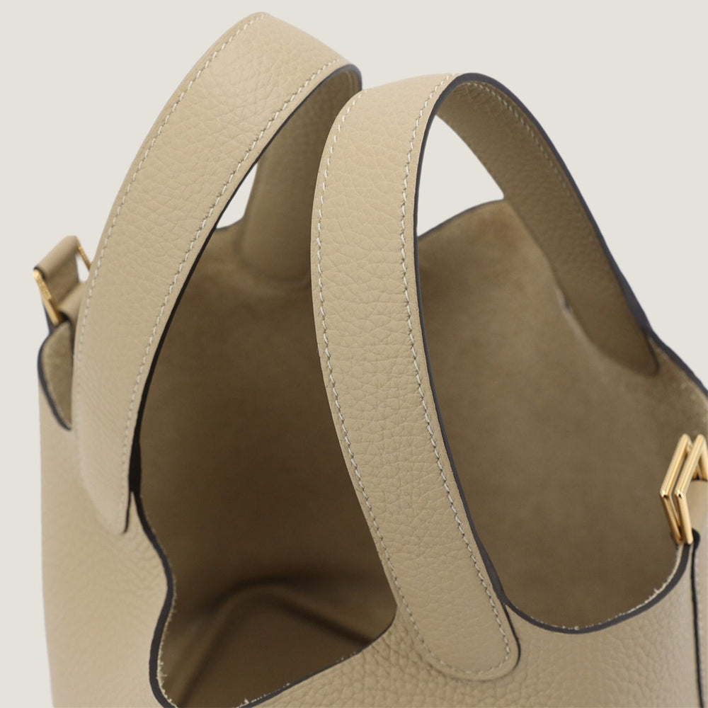Arvelle Lock Small Greige Soft Grain Calfskin Bucket Bag - Arvelle Paris