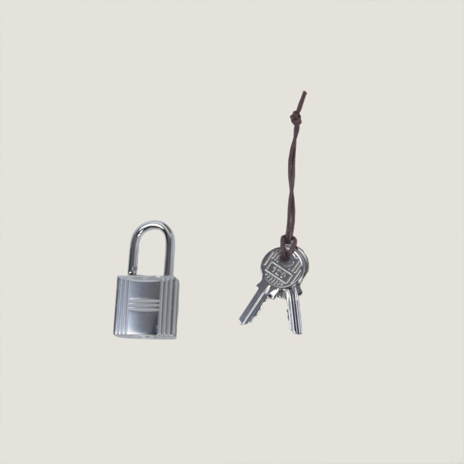 Arvelle Lock Small Desert Beige Soft Grain Calfskin Bucket Bag - Arvelle Paris