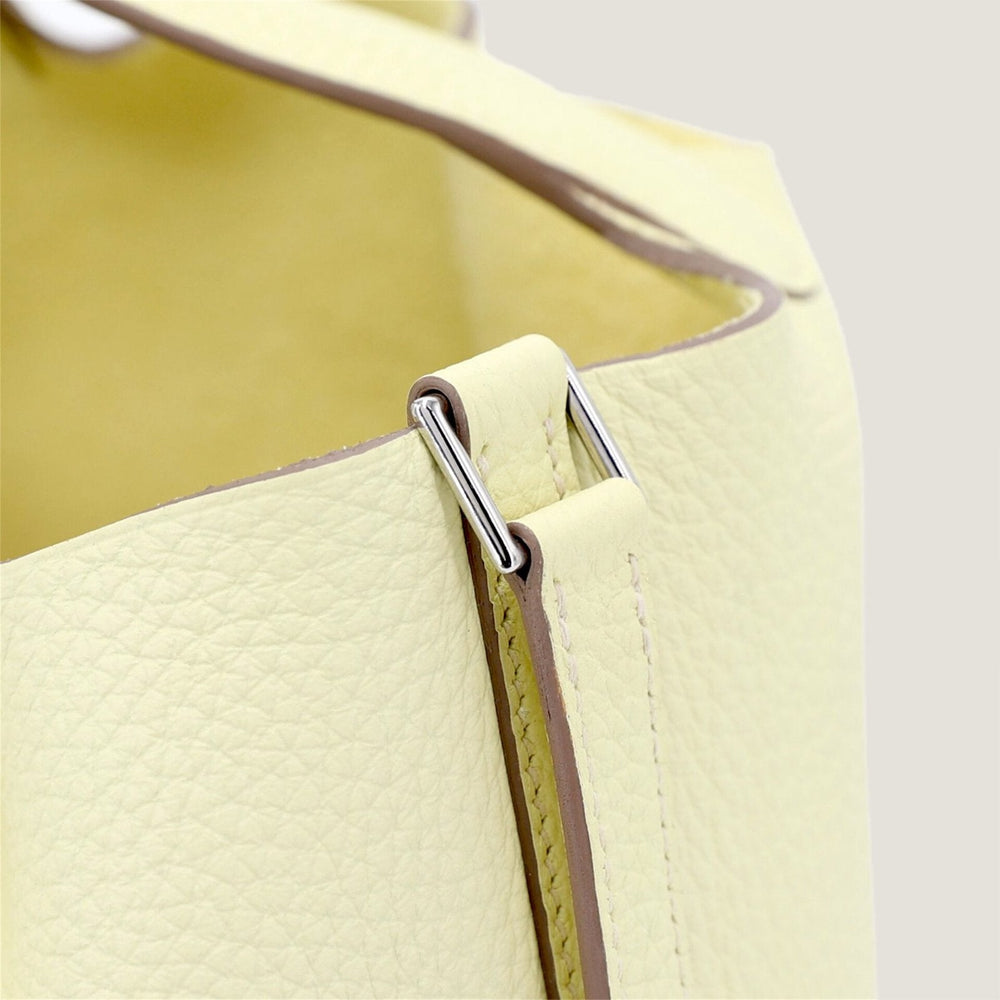 Arvelle Lock Small Sunlit Yellow Soft Grain Calfskin Bucket Bag - Arvelle Paris