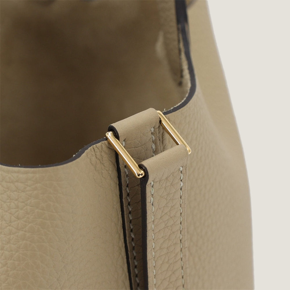 Arvelle Lock Small Greige Soft Grain Calfskin Bucket Bag - Arvelle Paris