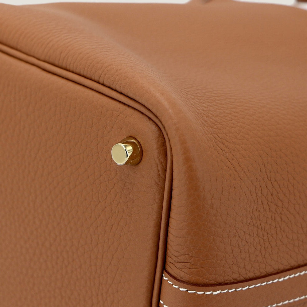 Arvelle Lock Small Champagne Gold Soft Grain Calfskin Bucket Bag - Arvelle Paris