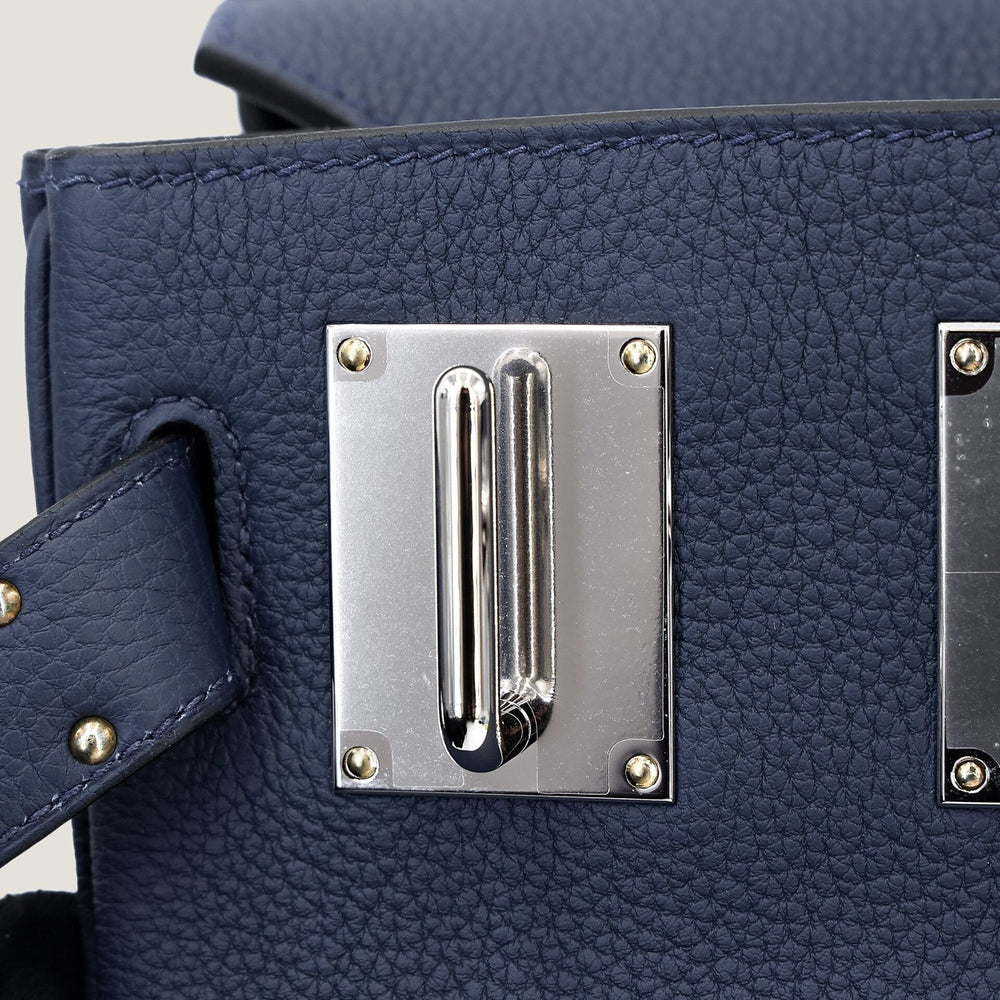 Small Navy Pebbled Calfskin Backpack - Arvelle Paris